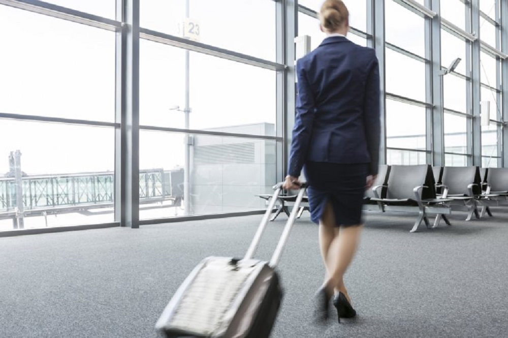Flight attendant walking at the airport