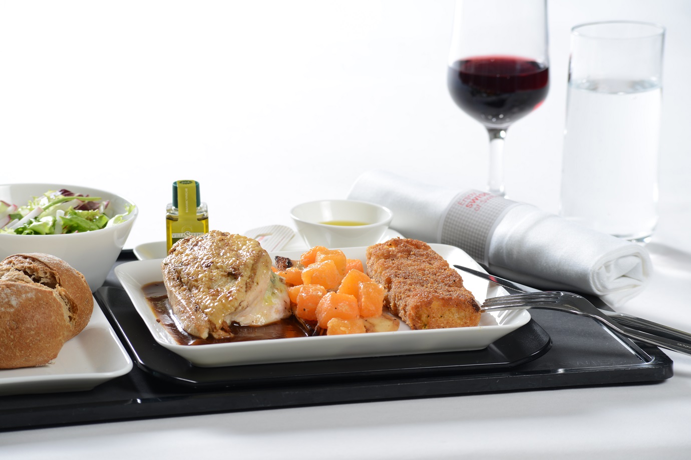 business_chicken-breast-filled-with-spinach-and-sbrinz-cheese-served-with-baked-polenta-caramelized-parsnips