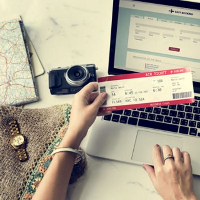 flight_booking_laptop_ticket_camera