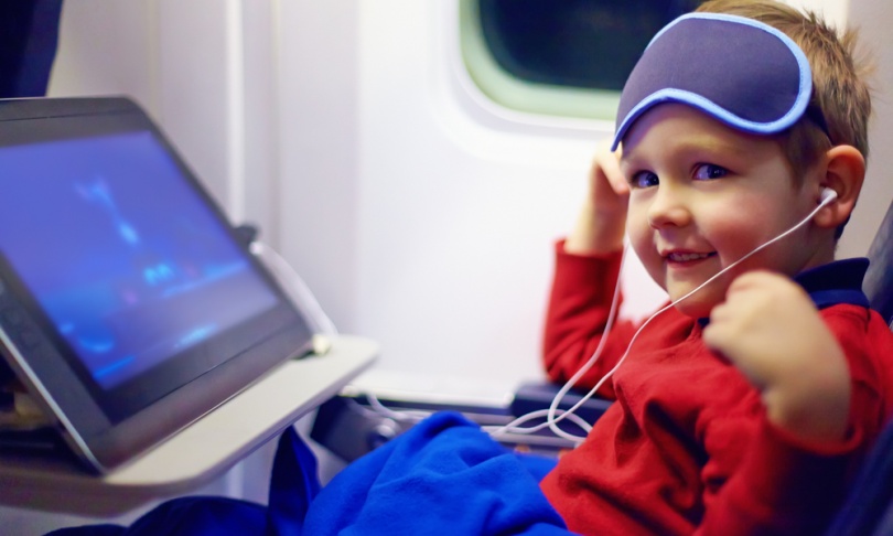 children-on-airplane-810x486