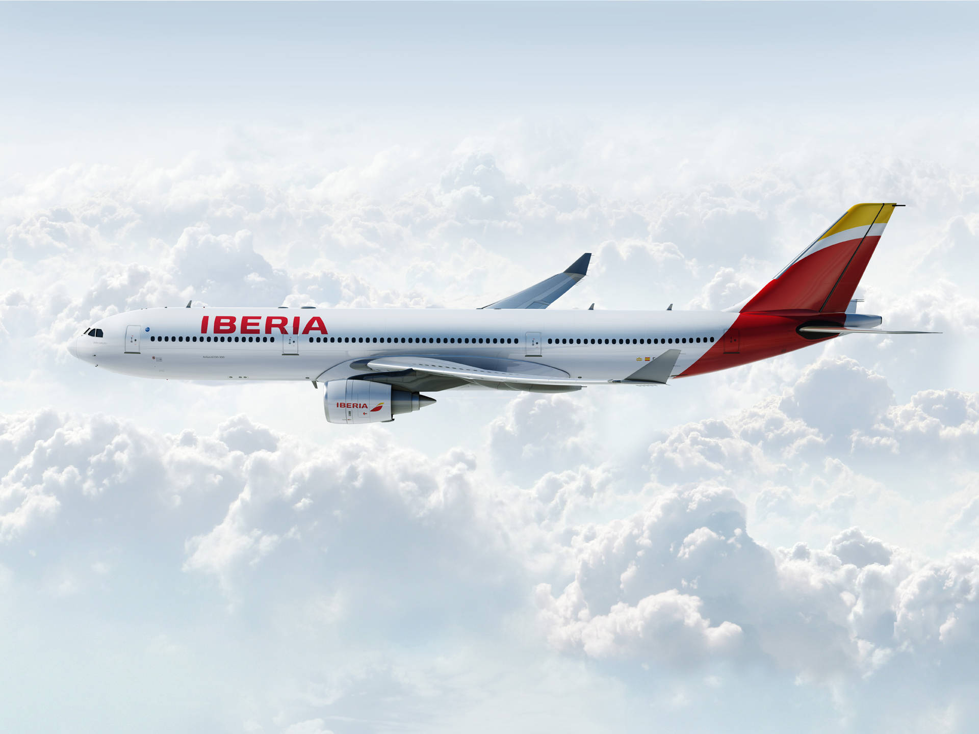 iberia-airlines-airplane-white-cloudy-skies-2nitkch6hlraf66k